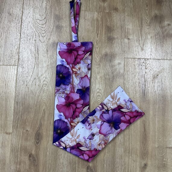 floral-pink-mauve-lyrcra-tie-in-tail-bag-for-horses-buggez-bugeyes